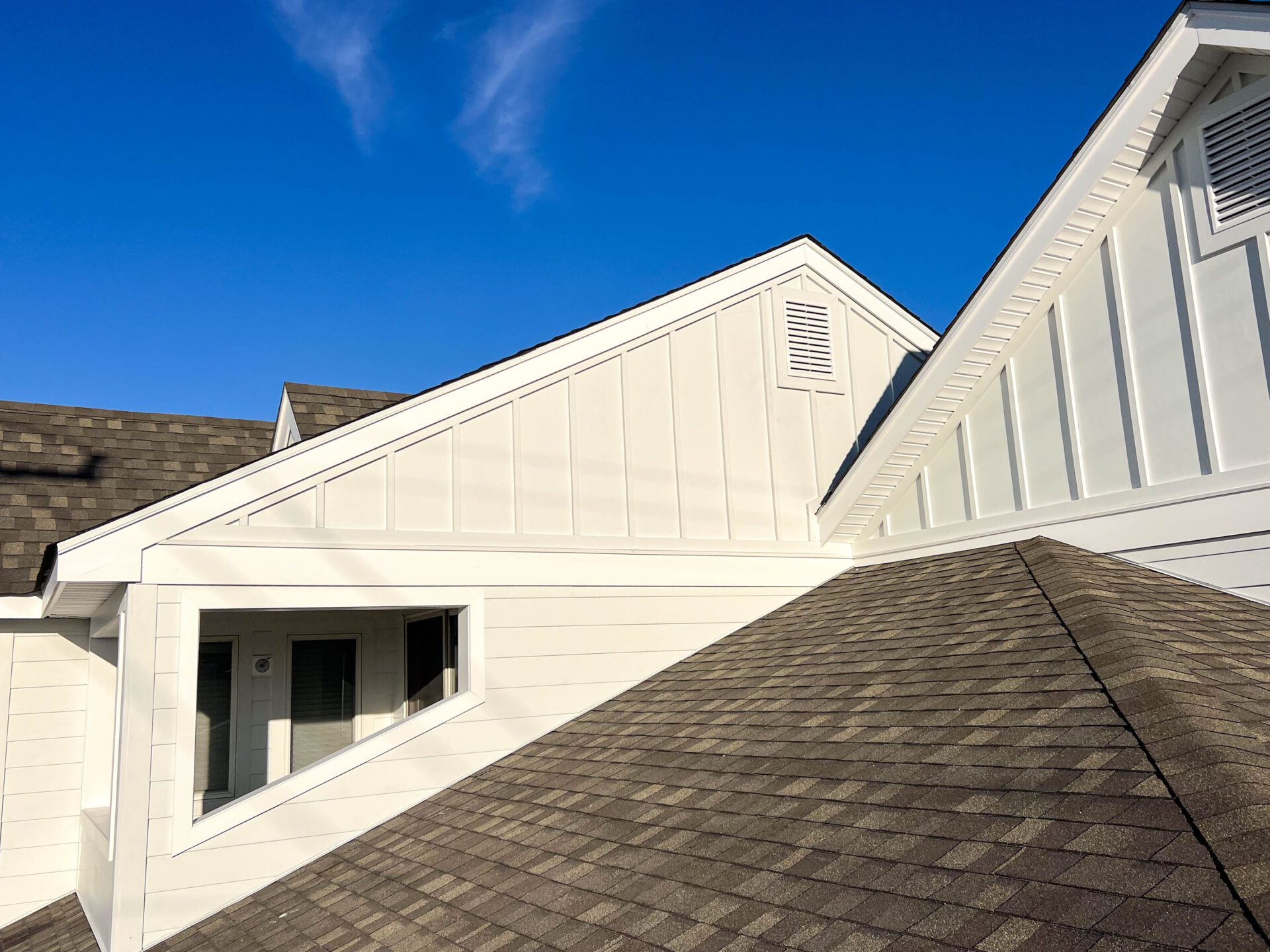 asphalt roofing paired with board and batten siding ml roofing and siding Premium Materials<br />