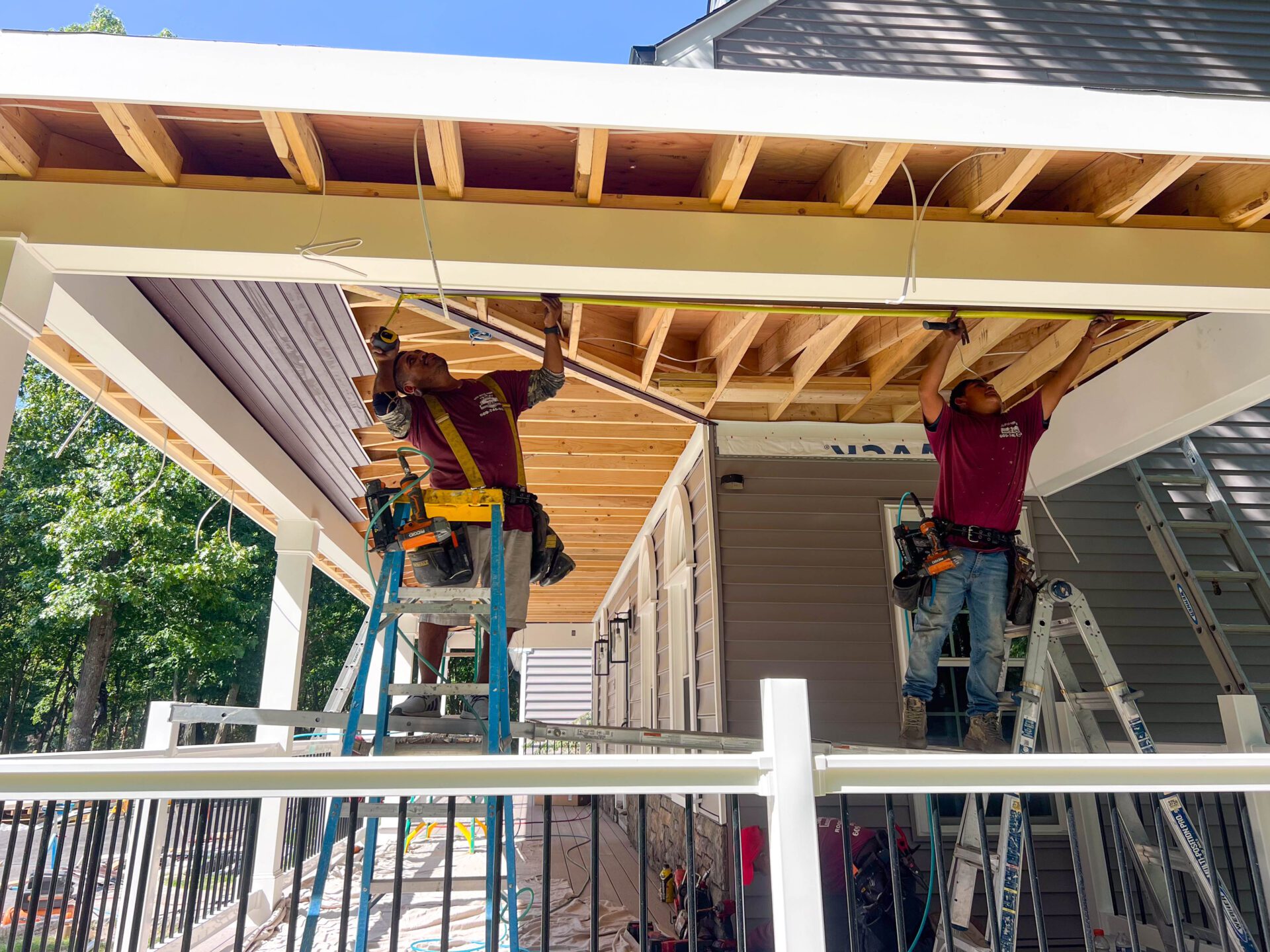 ml roofing and siding carpenters installing soffit ml roofing and siding carpenters installing soffit